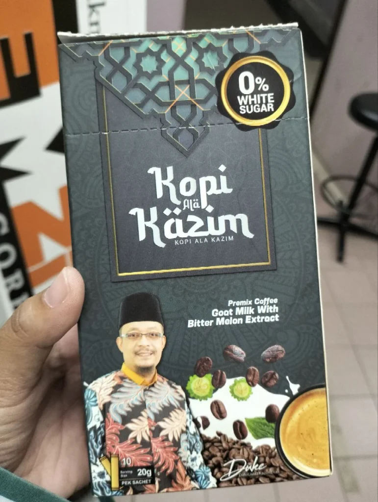 Kopi Ala Kazim box held in hand, front view