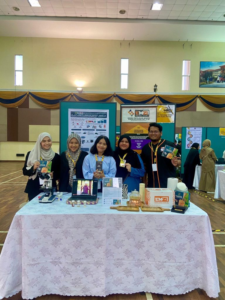 MIIEX’24: Team members holding products at the booth